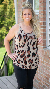 Be Scene Leopard Knit Tank Top - Fate & Co. This leopard print knit tank is one of a kind. It's the perfect stand alone statement top or can be layered beautifully under a blazer, cardigan or jacket! It features a relaxed fit, soft and lightweight stretch knit fabric, and a round hem with extended length. Pair it with your favorite black shorts or jeans and sandals for a classy yet fun summer look!  95% Polyester 5% Spandex  Color: Brown Leopard